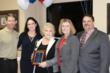 RE/MAX Southern Realty Agent Susie Kirkland named number nine commissions paid team in Florida for 2012. Pictured: Susie Kirkland (holding plaque), her team and RE/MAX Southern Realty Owners and Brokers Kerry Veach and Brad Shoults
